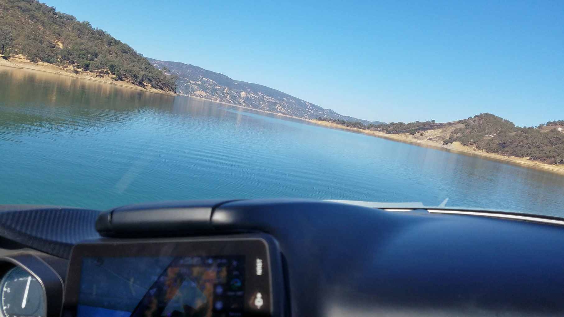 a view from flying plane over lake